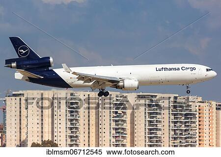 A McDonnell Douglas MD-11 aircraft of Lufthansa Cargo with the registration D-ALCB lands at Tel Aviv Airport, Israel, Asia View Large Photo Image Stock Photography - A McDonnell Douglas MD-11 aircraft of Lufthansa Cargo with the registration D-ALCB lands at Tel Aviv Airport, Israel, Asia. Fotosearch
