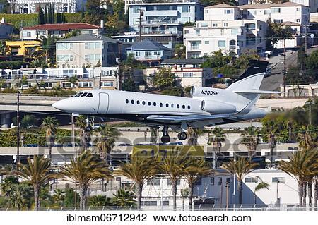 A private Dassault Falcon 900 with registration N900SF lands at San Diego Airport, USA, North America View Large Photo Image Stock Image - A private Dassault Falcon 900 with registration N900SF lands at San Diego Airport, USA, North America. Fotosearch