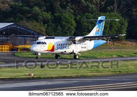 Stock Photography - A Satena ATR 42-500 aircraft with registration HK-4862 lands at Medellin airport, Colombia, South America. Fotosearch
