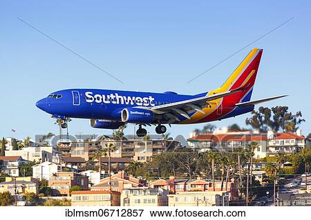 A Southwest Airlines Boeing 737-700 aircraft with registration number N761RR lands at San Diego airport, U. S View Large Photo Image Stock Photo - A Southwest Airlines Boeing 737-700 aircraft with registration number N761RR lands at San Diego airport, U. S. Fotosearch