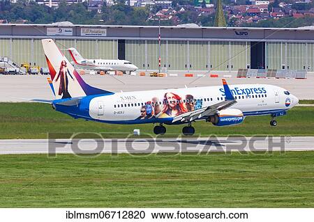 Stock Image - A SunExpress Germany Boeing 737-800 with the registration D-ASXJ and the special livery X-Men Dark Phoenix lands at Stuttgart Airport, Germany, Europe. Fotosearch