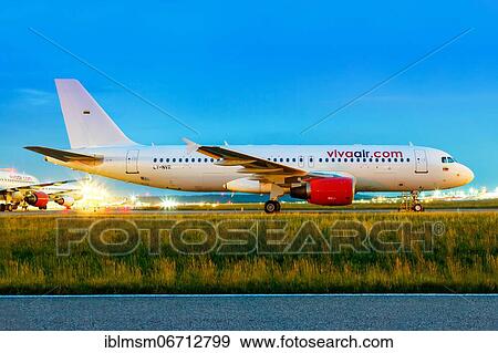 Stock Photo - A Vivaair Airbus A320 with registration LY-NVR at Stuttgart Airport, Germany, Europe. Fotosearch