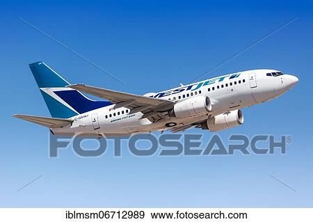 Stock Photo - A Westjet Boeing 737-600 aircraft with registration C-GXWJ takes off from Phoenix Airport, USA, North America. Fotosearch