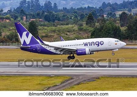 A Wingo Boeing 737-700 aircraft with registration number HP-1525CMP lands at Medellin Rio Airport (MDE), Medellin, Colombia, South America View Large Photo Image Stock Image - A Wingo Boeing 737-700 aircraft with registration number HP-1525CMP lands at Medellin Rio Airport (MDE), Medellin, Colombia, South America. Fotosearch