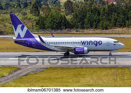 Stock Photography - A Wingo Boeing 737-700 aircraft with registration number HP-1378CMP at Medellin Rio Airport (MDE), Medellin, Colombia, South America. Fotosearch