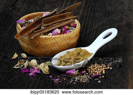 Stock Image - Advieh, spice mix, Persian cuisine, rose buds, rose petals, cardamom, cinnamon, cumin powder, cumin. Fotosearch