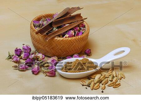 Stock Photo - Advieh, spice mix, Persian cuisine, rose buds, rose petals, cardamom, cinnamon, cumin powder, cumin. Fotosearch