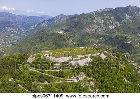 Stock Photo - Aerial view Fort du Barbonnet above Sospel, built by France 1883-1886 on the 847 meters high mountain Barbonnet, Departement Alpes-Maritimes, Region Provence-Alpes-Cote d'Azur, South of France, France, Europe. Fotosearch