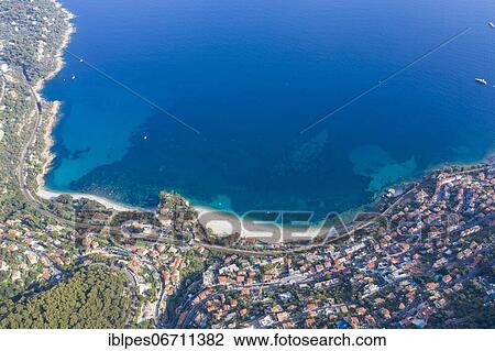 Aerial view of Roquebrune Cap Martin with the beaches Golfe Bleu and Buse west of Cap Martin and the Pointe de Cabbe, seen from Mont Gros, Department Alpes-Maritimes, Region Provence-Alpes-Cote d'Azur, South of France, France, Europe View Large Photo Image Stock Image - Aerial view of Roquebrune Cap Martin with the beaches Golfe Bleu and Buse west of Cap Martin and the Pointe de Cabbe, seen from Mont Gros, Department Alpes-Maritimes, Region Provence-Alpes-Cote d'Azur, South of France, France, Europe. Fotosearch