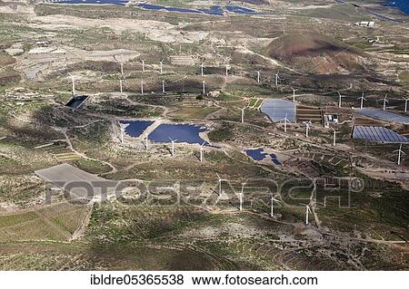 Aerial view of solar plants and wind turbines, Tenerife, Spain, Europe View Large Photo Image Stock Photo - Aerial view of solar plants and wind turbines, Tenerife, Spain, Europe. Fotosearch