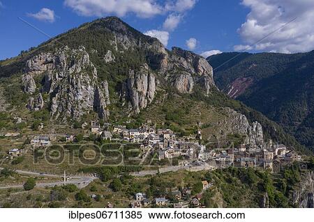 Stock Photography - Aerial view of the mountain village Roubion in the hinterland of Nice, Departement Alpes-Maritimes, Region Provence-Alpes-Cote d'Azur, France, Europe. Fotosearch