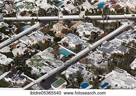 Aerial view streets of El Poris, Tenerife, Spain, Europe View Large Photo Image Stock Image - Aerial view streets of El Poris, Tenerife, Spain, Europe. Fotosearch