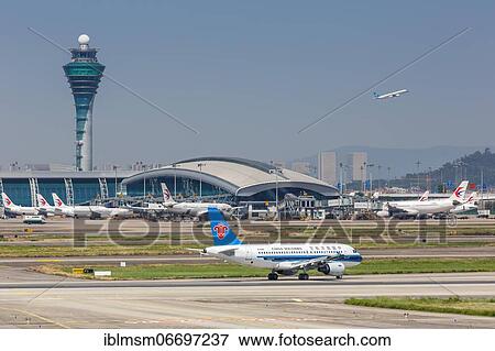 Aircraft, terminal and tower at Guangzhou Baiyun Airport (CAN), Guangzhou, China, Asia View Large Photo Image Stock Photo - Aircraft, terminal and tower at Guangzhou Baiyun Airport (CAN), Guangzhou, China, Asia. Fotosearch