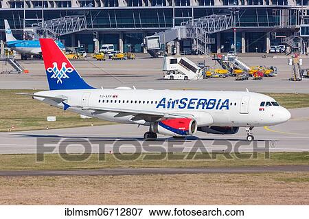 Stock Photo - An Air Serbia Airbus A319 with registration number YU-APF at Stuttgart Airport, Germany, Europe. Fotosearch