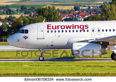 An Airbus A319 aircraft of Eurowings with registration number D-AGWE at Stuttgart Airport, Germany, Europe View Large Photo Image Picture - An Airbus A319 aircraft of Eurowings with registration number D-AGWE at Stuttgart Airport, Germany, Europe. Fotosearch