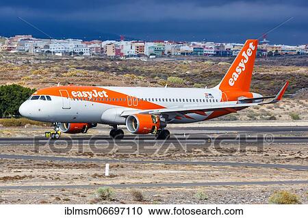 An Airbus A320 aircraft of EasyJet Europe with registration number OE-IVR at Tenerife South Airport (TFS), Tenerife, Spain, Europe View Large Photo Image Stock Image - An Airbus A320 aircraft of EasyJet Europe with registration number OE-IVR at Tenerife South Airport (TFS), Tenerife, Spain, Europe. Fotosearch