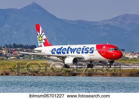 Stock Photo - An Airbus A320 aircraft of Edelweiss with registration HB-IJW at Corfu Airport (CFU), Corfu, Greece, Europe. Fotosearch