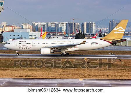 An Airbus A330-200 aircraft of Libyan Airlines with registration number 5A-LAU at Istanbul airport, Turkey, Asia View Large Photo Image Picture - An Airbus A330-200 aircraft of Libyan Airlines with registration number 5A-LAU at Istanbul airport, Turkey, Asia. Fotosearch