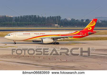 An Airbus A330-300 aircraft of Hainan Airlines with registration number B-8015 at Beijing Airport (PEK), Beijing, China, Asia View Large Photo Image Stock Photo - An Airbus A330-300 aircraft of Hainan Airlines with registration number B-8015 at Beijing Airport (PEK), Beijing, China, Asia. Fotosearch