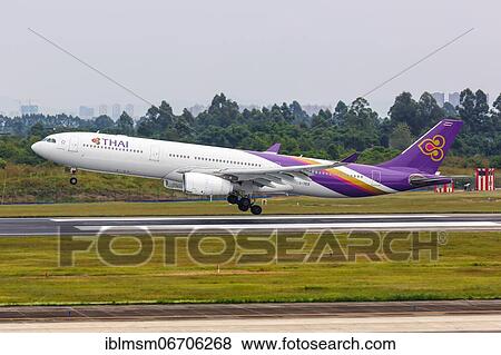 An Airbus A330-300 aircraft of Thai Airways International with registration number HS-TES at Chengdu Airport, China, Asia View Large Photo Image Stock Photo - An Airbus A330-300 aircraft of Thai Airways International with registration number HS-TES at Chengdu Airport, China, Asia. Fotosearch