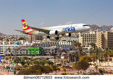 Stock Image - An Arkia Airbus A321neo with the registration number 4X-AGK lands at Eilat Airport, Israel, Asia. Fotosearch