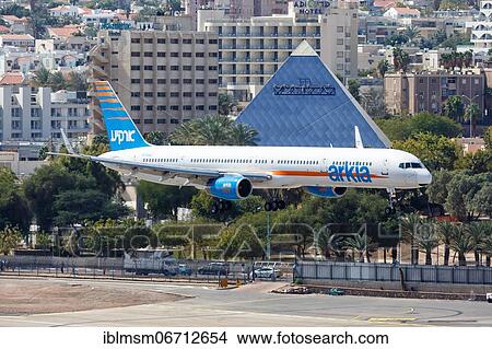 An Arkia Boeing 757-300 aircraft with registration number 4X-BAU lands at Eilat Airport, Israel, Asia View Large Photo Image Picture - An Arkia Boeing 757-300 aircraft with registration number 4X-BAU lands at Eilat Airport, Israel, Asia. Fotosearch