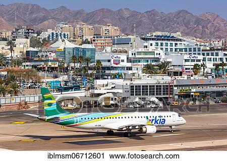 An Arkia Embraer 195 with registration 4X-EMA takes off from Eilat Airport, Israel, Asia View Large Photo Image Stock Image - An Arkia Embraer 195 with registration 4X-EMA takes off from Eilat Airport, Israel, Asia. Fotosearch