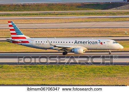 An Embraer 190 aircraft of American Airlines with the registration N945UW at Atlanta Airport, USA, North America View Large Photo Image Stock Photo - An Embraer 190 aircraft of American Airlines with the registration N945UW at Atlanta Airport, USA, North America. Fotosearch