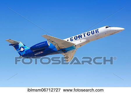 Stock Photo - An Embraer ERJ 135LR aircraft of Contour Airlines with registration N16525 takes off from Phoenix Airport, USA, North America. Fotosearch