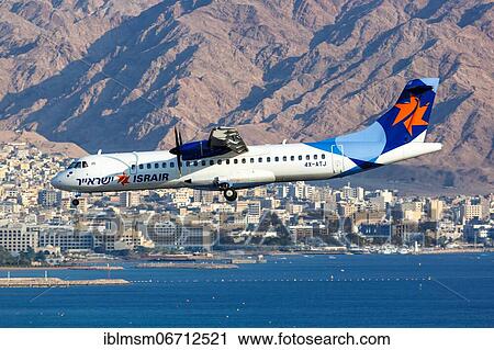 Stock Image - An Israir ATR 72-500 aircraft with registration number 4X-ATJ lands at Eilat Airport, Israel, Asia. Fotosearch