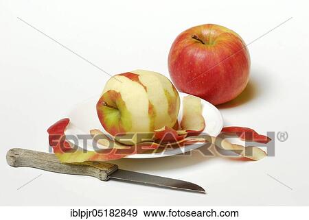 Apple, apple skin, apple peel, peeled, Pink Lady variety, knife, paring knife, apples View Large Photo Image Stock Photo - Apple, apple skin, apple peel, peeled, Pink Lady variety, knife, paring knife, apples. Fotosearch