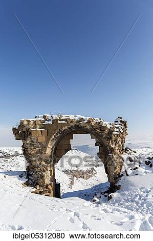 Bagsekisi Gate in Ani is a ruined medieval Armenian town, now in the Turkish province of Kars and on the closed border with Armenia View Large Photo Image Stock Image - Bagsekisi Gate in Ani is a ruined medieval Armenian town, now in the Turkish province of Kars and on the closed border with Armenia. Fotosearch