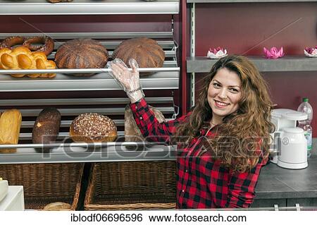 Bakery saleswoman during her practical training at the teaching counter in the vocational school, Düsseldorf, North Rhine-Westphalia, Germany, Europe View Large Photo Image Stock Photograph - Bakery saleswoman during her practical training at the teaching counter in the vocational school, Düsseldorf, North Rhine-Westphalia, Germany, Europe. Fotosearch