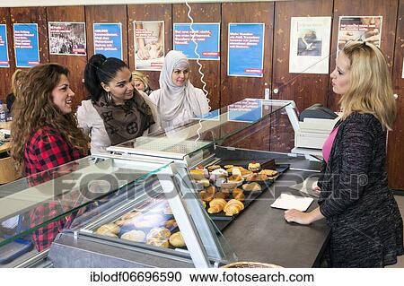 Bakery saleswomen during their practical training at the teaching counter in the vocational school, Düsseldorf, North Rhine-Westphalia, Germany, Europe View Large Photo Image Stock Image - Bakery saleswomen during their practical training at the teaching counter in the vocational school, Düsseldorf, North Rhine-Westphalia, Germany, Europe. Fotosearch