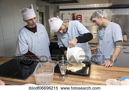 Baking in practical lessons in home economics, integration of refugees in the AVI class (Ausbildungsvorbereitung International) at the Elly-Heuss-Knapp-Schule, a vocational college of the city of Düsseldorf, North Rhine-Westphalia, Germany, Europe View Large Photo Image Stock Photography - Baking in practical lessons in home economics, integration of refugees in the AVI class (Ausbildungsvorbereitung International) at the Elly-Heuss-Knapp-Schule, a vocational college of the city of Düsseldorf, North Rhine-Westphalia, Germany, Europe. Fotosearch