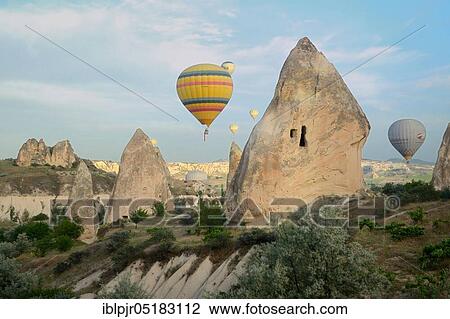 Stock Image - Balloon flight over Göreme valley, Anatolia, Central Anatolia, hot air balloon, Cappadocia, Turkey, Asia. Fotosearch