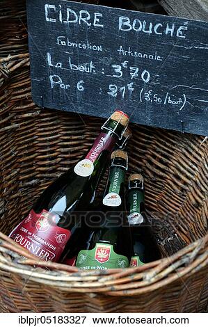 Basket with bottles of cider, Normandy, sparkling cider, Honfleur, France, Europe View Large Photo Image Stock Photo - Basket with bottles of cider, Normandy, sparkling cider, Honfleur, France, Europe. Fotosearch