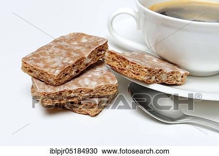 Stock Image - Basler Leckerli, Basler Leckerli with cup of coffee, Lackerli, Läckerli, gingerbread. Fotosearch