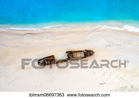 Beach with shipwreck, drone shot, Navagio Beach, Zakynthos, Greece, Europe View Large Photo Image Stock Image - Beach with shipwreck, drone shot, Navagio Beach, Zakynthos, Greece, Europe. Fotosearch