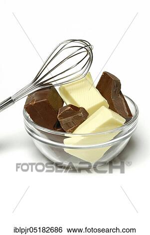 Block chocolate in pieces, chocolate, whole milk chocolate, milk chocolate, cake glaze, couverture, whisk View Large Photo Image Stock Photograph - Block chocolate in pieces, chocolate, whole milk chocolate, milk chocolate, cake glaze, couverture, whisk. Fotosearch