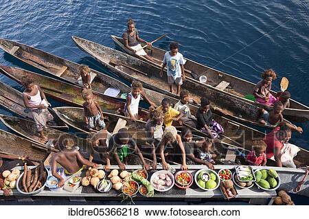 Boat market, locals selling fruits and vegetables, Florida Islands, Solomon Islands, Oceania View Large Photo Image Stock Photo - Boat market, locals selling fruits and vegetables, Florida Islands, Solomon Islands, Oceania. Fotosearch