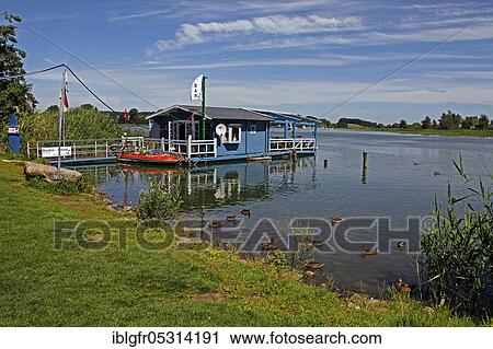 Boat rental, Peenestrom, Wolgast, Mecklenburg-Vorpommern, Germany, Europe View Large Photo Image Stock Image - Boat rental, Peenestrom, Wolgast, Mecklenburg-Vorpommern, Germany, Europe. Fotosearch