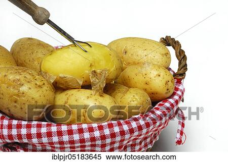 Boiled jacket potatoes in basket View Large Photo Image Stock Photography - Boiled jacket potatoes in basket. Fotosearch