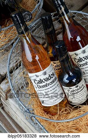 Stock Photo - Bottles of calvados, spirits, apple brandy, alcohol, brandy, apple brandy, shop in Honfleur, Normandy, France, Europe. Fotosearch