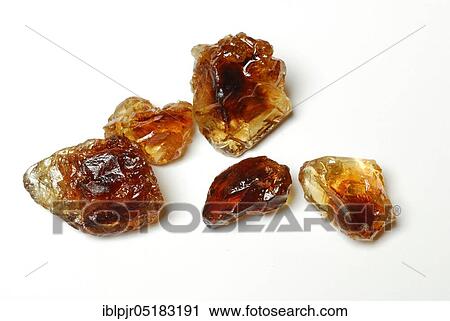 Stock Image - Brown rock candy, sweet, rock candy. Fotosearch