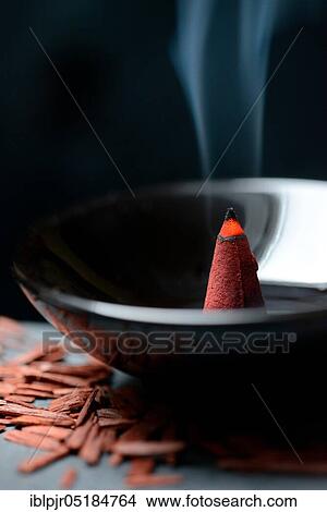 Burning incense cone and sandalwood View Large Photo Image Picture - Burning incense cone and sandalwood. Fotosearch