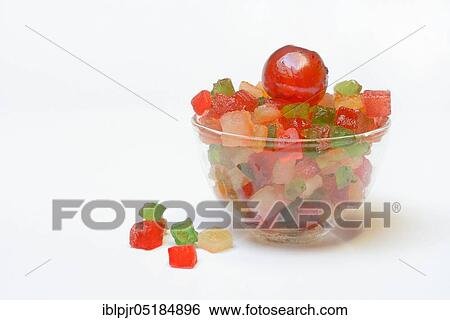 Stock Photograph - Candied fruit, candied fruit cubes, fruit cubes, heart cherry, candied cherry. Fotosearch
