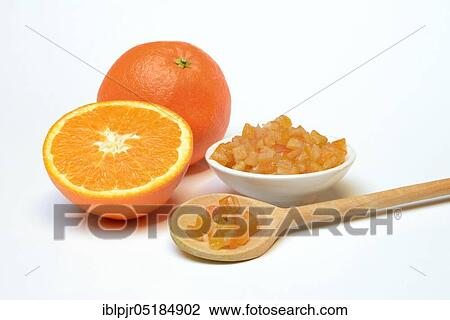 Candied orange peel cubes with orange, halved View Large Photo Image Stock Image - Candied orange peel cubes with orange, halved. Fotosearch
