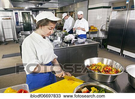 Canteen kitchen in a vocational college in Düsseldorf, trainees manage the school's catering as part of their training, practical lessons in the canteen kitchen, Düsseldorf, Germany, Europe View Large Photo Image Stock Image - Canteen kitchen in a vocational college in Düsseldorf, trainees manage the school's catering as part of their training, practical lessons in the canteen kitchen, Düsseldorf, Germany, Europe. Fotosearch