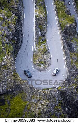Cars in hairpin bends at the mountain road Trollstigen, near Åndalsnes, Møre og Romsdal, Vestland, Norway, Europe View Large Photo Image Stock Image - Cars in hairpin bends at the mountain road Trollstigen, near Åndalsnes, Møre og Romsdal, Vestland, Norway, Europe. Fotosearch